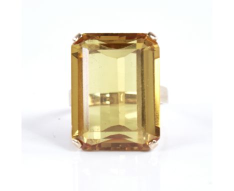 A large late 20th century 14ct gold yellow sapphire? dress ring, sapphire dimensions: length - 21.06mm, width - 15.95mm, dept