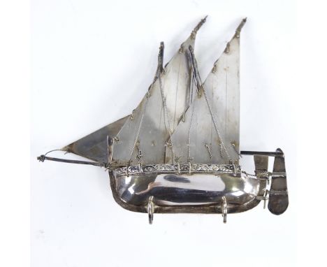 A modern Continental sterling silver miniature model ship, length 12.5cm, height 11cmFair overall condition, light abrasions 