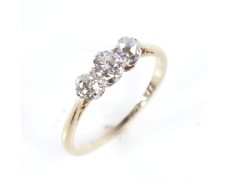 An early 20th century 18ct gold 3-stone diamond ring, set with round brilliant and old-cut diamonds, total diamond content ap