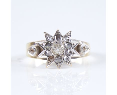 A 19th century unmarked gold diamond cluster starburst ring, circa 1890, set with old mine-cut and rose-cut diamonds, total d