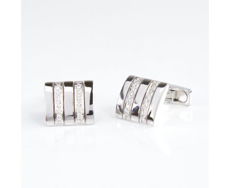 A pair of 18ct white gold diamond cufflinks, each rectangular panel set with a double-row of round brilliant-cut diamonds, to
