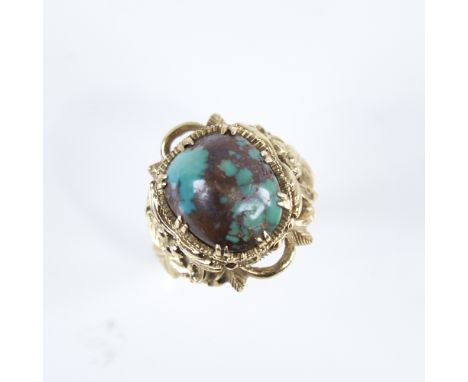 A Vintage 14ct gold cabochon turquoise matrix ring, signed Larry, possibly Navajo, pierced openwork floral shoulders with ope