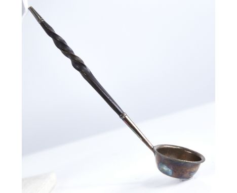 A small Georgian unmarked silver and whale baleen-handled toddy ladle, length 18cmGood overall condition, handle has a few ed