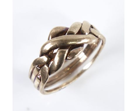 A modern 9ct gold puzzle knot ring, formed as 4 separate bands intertwined, setting height 10.8mm, size X, 5.7gGood overall c