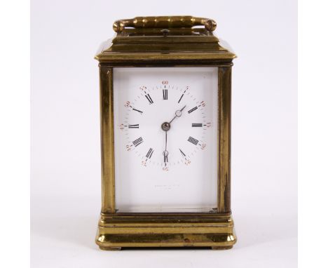 A 19th century brass-cased repeating carriage clock, white enamel dial with Roman numeral hour markers, bevelled-glass viewin