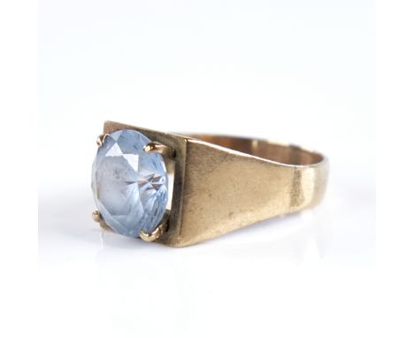 A late 20th century 9ct gold blue topaz dress ring, setting height 10.3mm, size N, 4.5g Good overall condition, topaz is a pa