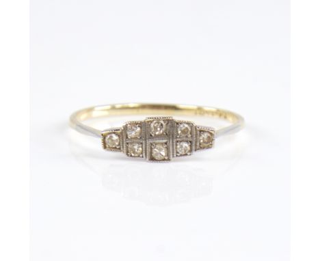 An Art Deco 18ct gold diamond panel ring, set with eight-cut diamonds with openwork bridge, total diamond content approx 0.1c