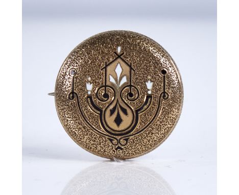 A Victorian unmarked high carat gold and enamel bombe brooch, textured settings with Adams style decoration and loop for hang