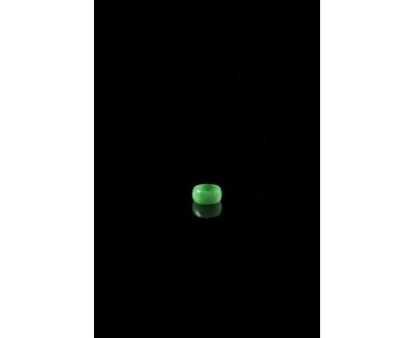 A ring China, 20th Century Light green jade. Diametro 2 cm Start Price: €200