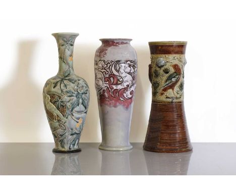 Three Doulton Lambeth and Royal Doulton stoneware vases, by Mark V Marshall, two with raised bird-design banding and a panel,