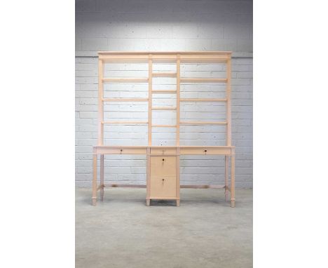 A birch desk,modern, designed by David Linley for Linley, the rectangular top over two frieze drawers and an extending oak su