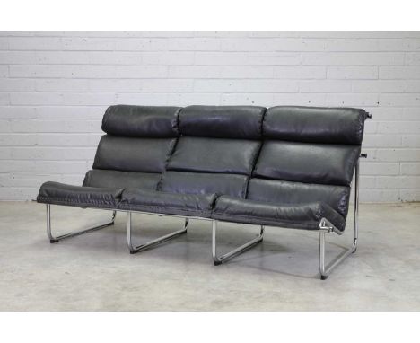 A Finnish chrome and leather settee,designed by Yrjö Kukkapuro, with seat, back and neck cushions upholstered in black leathe