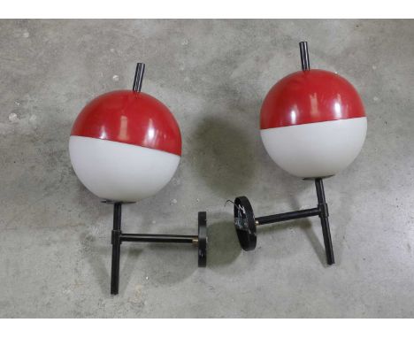 A pair of Italian 'Model 2071' wall lights,1950s, by Stilnovo, each with a glass globe, with red enamelled cap, mounted on a 