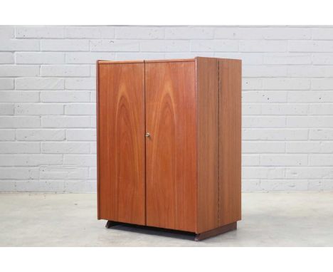 A Danish 'Magic Box' teak desk,1960s, designed by Ernst Mumenthaler and Otto Meier, 83cm wide, open 167cm 54cm deep115cm high