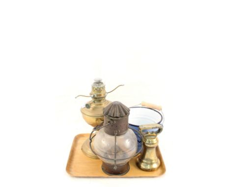 A Victorian 7lb bell weight, two oil lamps plus Adnams enamel pail