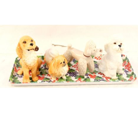Four various Sylvac dogs