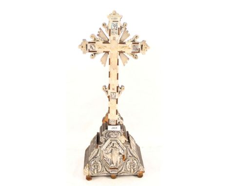 An 18th Century Italian wooden crucifix with mother of pearl saint decoration, inscription and date plaque 1773 to rear