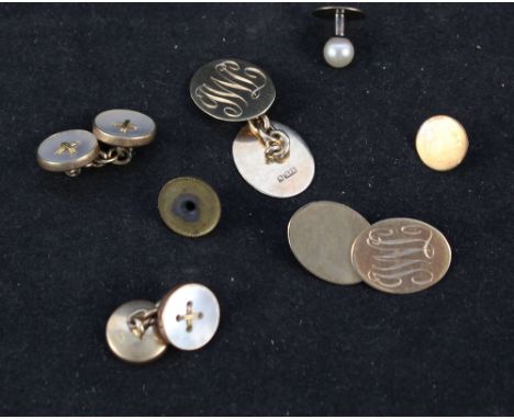 A pair of oval 9ct gold cufflinks with engraved initials, a pair of 9ct gold mother of pearl cufflinks in the form of bullets