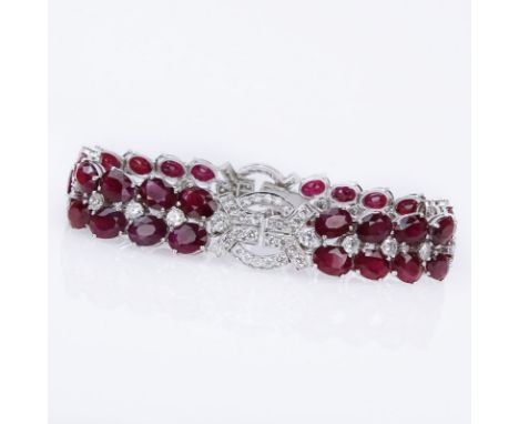 Art Deco style Approx. 41.50 Carat Oval Cut Burma Ruby, 4.35 Carat Round Brilliant Cut Diamond and 18 Karat White Gold Bracel