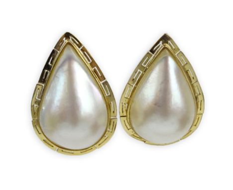 Vintage Large Mabe Pearl  and 14 Karat Yellow Gold Earrings. Signed. Good condition. Measure 1-3/16" H, 7/8" W. Approx. weigh