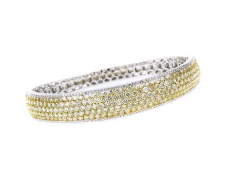 Mark Oliva signed Approx. 7.50 Karat Round Brilliant Cut Fancy Light Yellow and White Diamond and 18 Karat White Gold Bangle 
