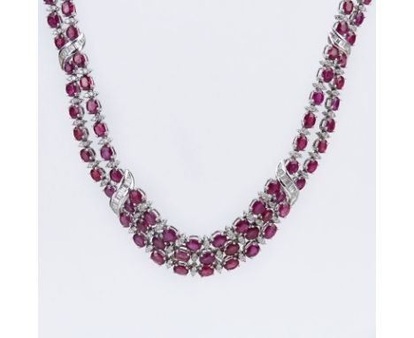 Approx. 45.0 Carat Oval Cut Burma Ruby, 4.65 Carat Diamond and 18 Karat White Gold necklace. Rubies with vivid saturation of 