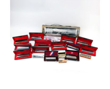 Grouping of Fifty Eight (58) Vintage Harmonicas. Includes: 13 hohner harmonicas in hard cases, tremolo harmonica, regal harmo