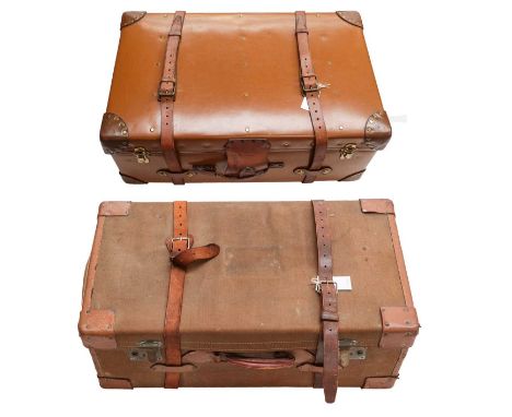 A large leather trunk, together with another canvas and leather suitcase