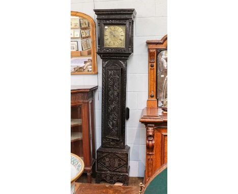 A carved oak thirty-hour single hand longcase clock, 18th century, 10.5" square brass dial with chapter ring signed Gil Kidd,