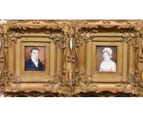 A pair of late 19th/early 20th century portrait miniatures depicting John Jackson and Mrs John Jackson, oil (not examined out
