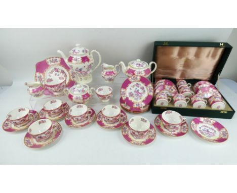 A Minton 'Pink Cockatrice' 28 piece&nbsp; tea service and a boxed 12 piece coffee set