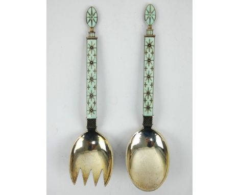A pair of Norwegian light blue enamelled silver servers by J Tostrup. Length 18cm. Gross weight 93 grams.