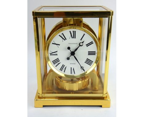 A Jaeger-LeCoultre ATMOS clock in gilt case, movement number 536679. Height 22.5cm, width 18cm, depth 13.5cm.