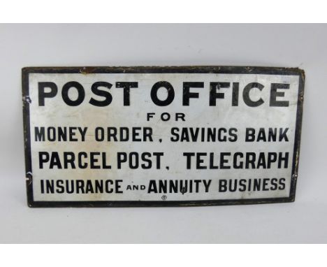 A period Post Office sign in black and white enamel. Age related rust and wear. 66cm x 33cm.