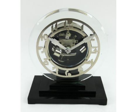 1930s Art Deco ATO mantel clock with glass dial, chrome case &amp; digits and three step bakelite base. Height 22.5cm.