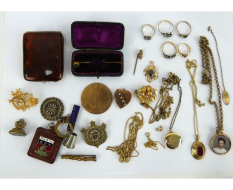 A mixed collection of costume jewellery and collectables, 19th century and later; including; a three stone ring with band mar