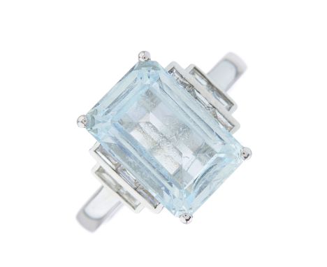 A 14ct gold aquamarine dress ring, with calibre-cut diamond stepped shoulders, aquamarine estimated weight 3.60ct, estimated 