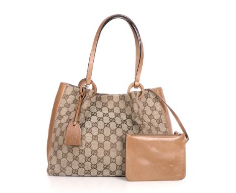 Gucci, a monogram handbag with pouch, crafted from the maker's classic GG monogram canvas, with smooth tan leather trim, dual