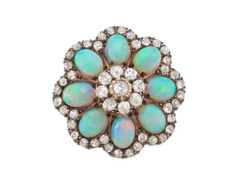 A late Victorian silver and gold, opal cabochon and old-cut diamond floral cluster brooch, estimated total diamond weight 1.8