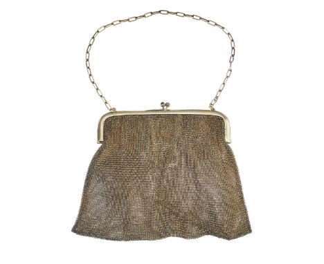 An early 20th century silver mesh purse, with sapphire cabochon double acorn clasp and a pencil inside, on chain, measures ap