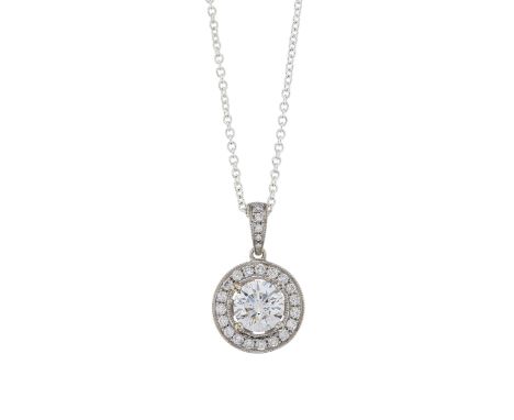 An 18ct gold brilliant-cut diamond single-stone pendant, with similarly-cut diamond halo and surmount, suspended from a white