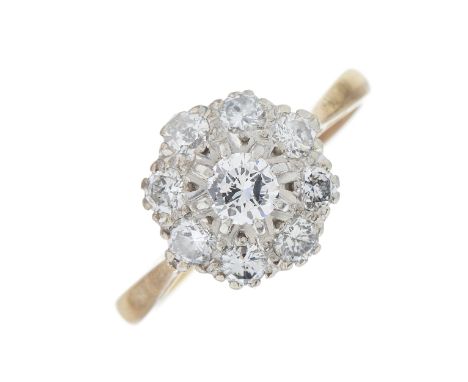 An 18ct gold and platinum brilliant-cut diamond floral cluster dress ring, estimated total diamond weight 0.75ct, I-J colour,