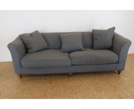 4 seater sofa with light gray melange fabric upholstery on wooden turned legs, h. 76, w. 240, d. 100 cm. (origin: Hotel Seven