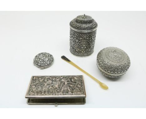 Lot of djokja silver objects, including tea caddy, powder box, pencil case, pill box, bone spoon, gross weight. 500gr.Lot djo