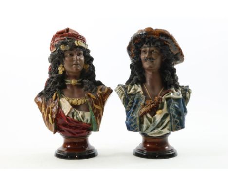 A pair of pottery gypsy busts, signed R. Sturm, Germany, h. 40  cm.Stel aardewerk buste's van zigeuner paar met instrument en