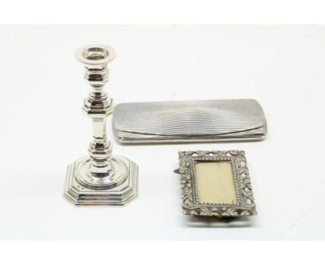 Silver 1-light candlestick, glasses case, and photo-frame,6ot zilverwerk waarbij eenlichts kandelaar, brillenkoker en  fotoli