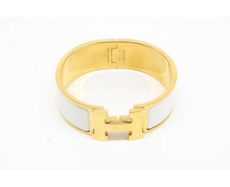 HERMES, Clic clac H, gilted steel bangle white enamel, (st1106)HERMES, clic clac H, verguld stalen armband met wit emaille  i