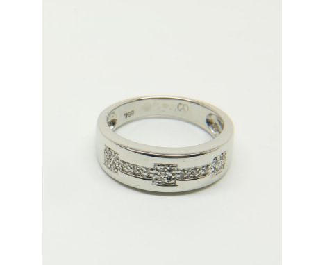 Whitegold ring mounted with diamonds 0.05 ct., 585/000Witgouden ring bezet met diamant  briljantslijpsel 0.05ct. geh.  585/00