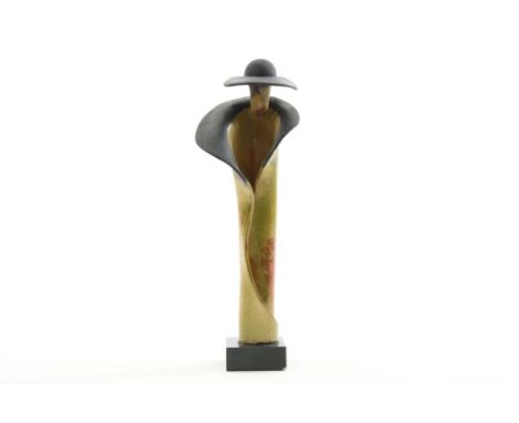 Ceramic sculpture of lady stading figure in coat and with head,  uncl. sign., h. 35 cm.Keramiek sculptuur van gestilleerd dam