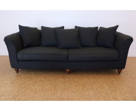 4 seater sofa with dark gray melange fabric upholstery on wooden turned legs, h. 76, w. 240, d. 100 cm. (origin: Hotel Seven 